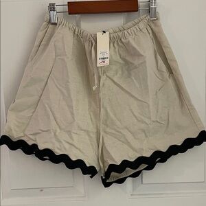 Francesca's Collections Beige High Waist Shorts with Black Scallop Trim